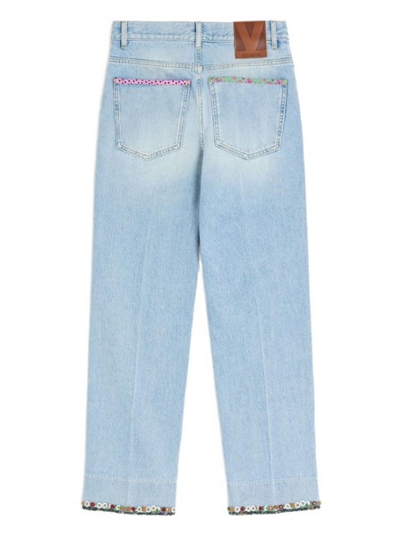 Valentino Garavani Denim trousers with embroidered flower trim for