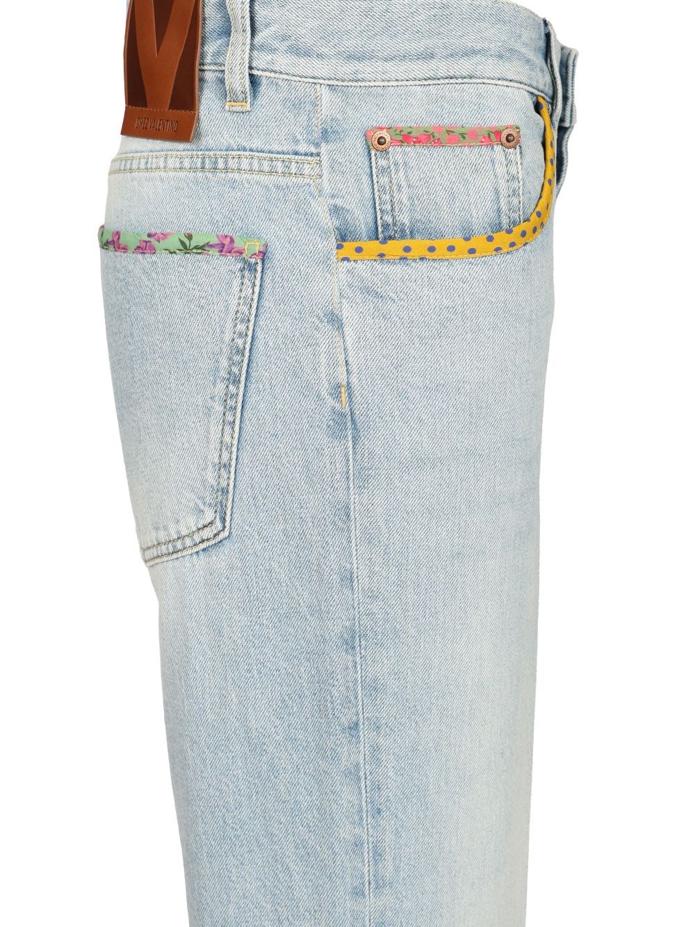 Valentino Garavani Denim trousers with embroidered flower trim for